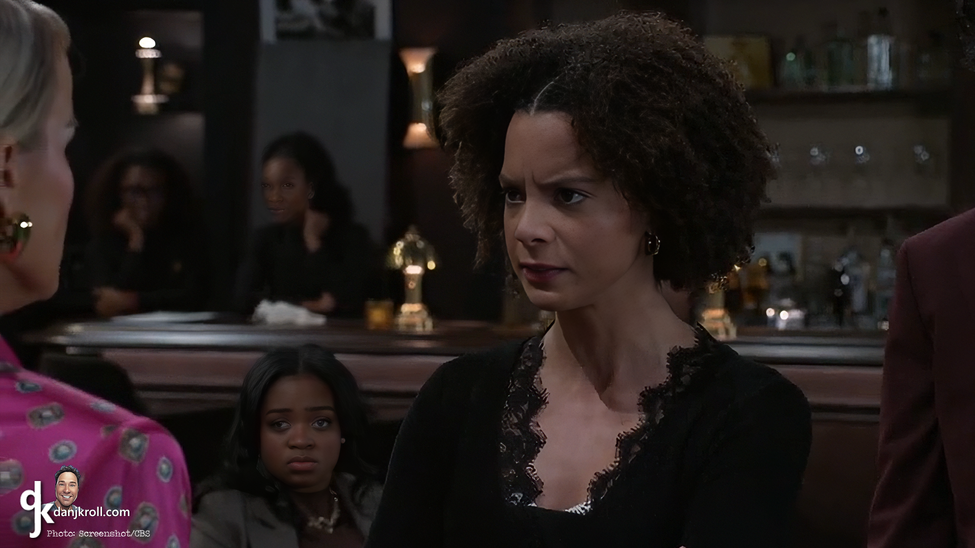 The extras paying attention to the McBride drama made this scene more believable and relateable. | Beyond the Gates